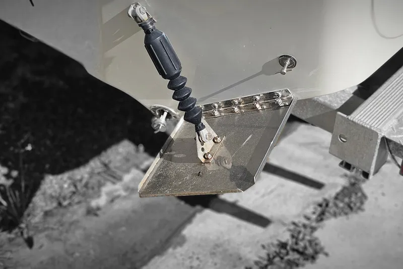 Slide: The Image of Trim tab on a 2016 Carolina Skiff 258 DLV boat, close-up view. - 21
