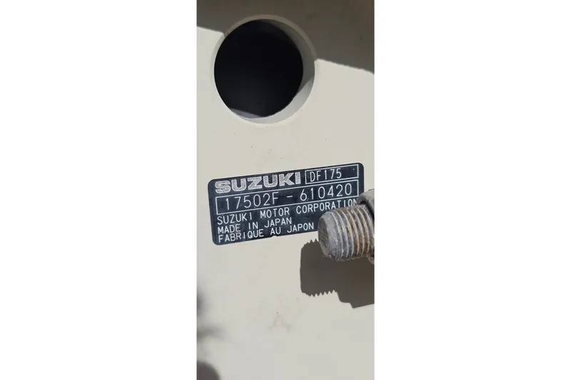 Slide: The Image of Suzuki DF175 engine label on a 2016 Carolina Skiff 258 DLV boat. - 23