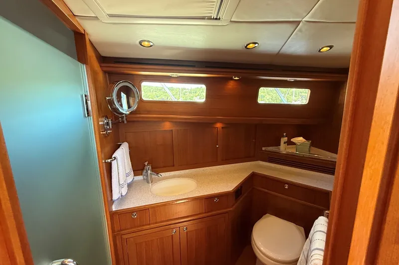 Slide: The Image of Luxurious wooden bathroom interior on 2013 York's Marine 46 Flybridge Cruiser. - 51