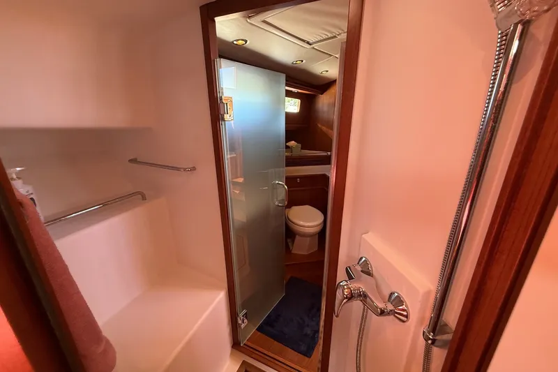 Slide: The Image of Bathroom interior of 2013 York's Marine 46 Flybridge Cruiser with shower and toilet. - 54