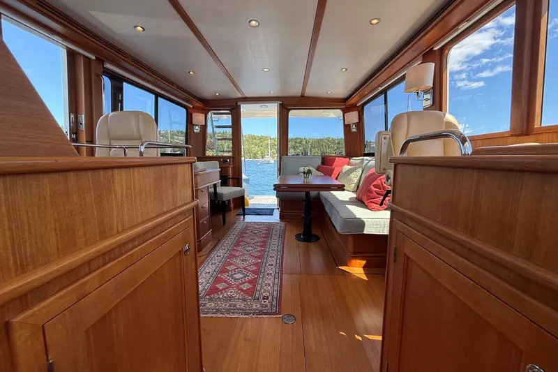 Slide: The Image of Luxurious interior of 2013 York's Marine 46 Flybridge Cruiser with elegant wood finish. - 40