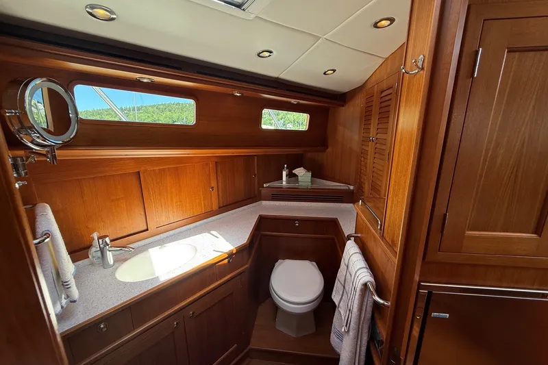 Slide: The Image of Luxurious wooden bathroom interior of 2013 York's Marine 46 Flybridge Cruiser yacht. - 50