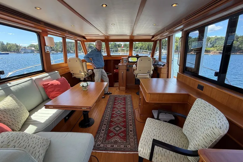 Slide: The Image of Luxurious interior of 2013 York's Marine 46 Flybridge Cruiser with scenic water views. - 31