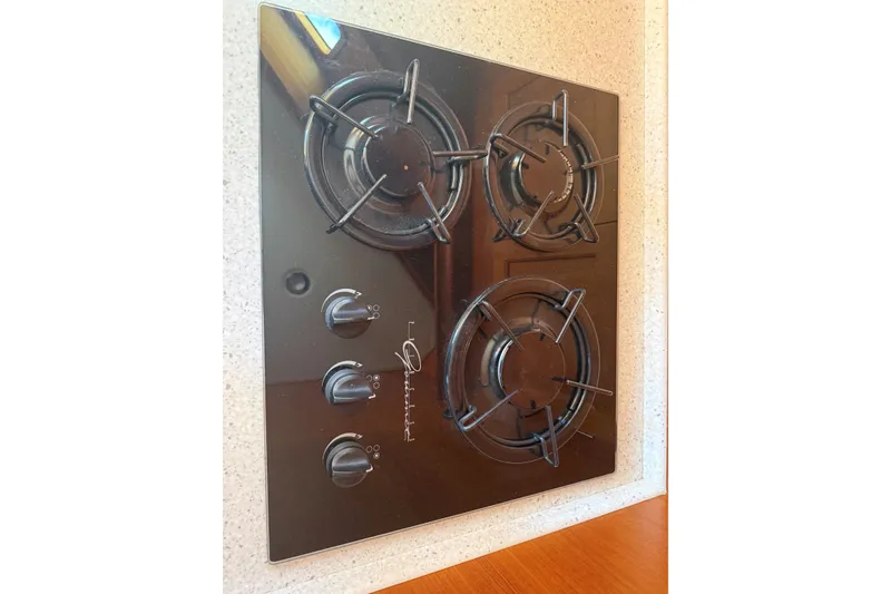 Slide: The Image of Gas stove with four burners on York's Marine 46 Flybridge Cruiser, 2013 model. - 45