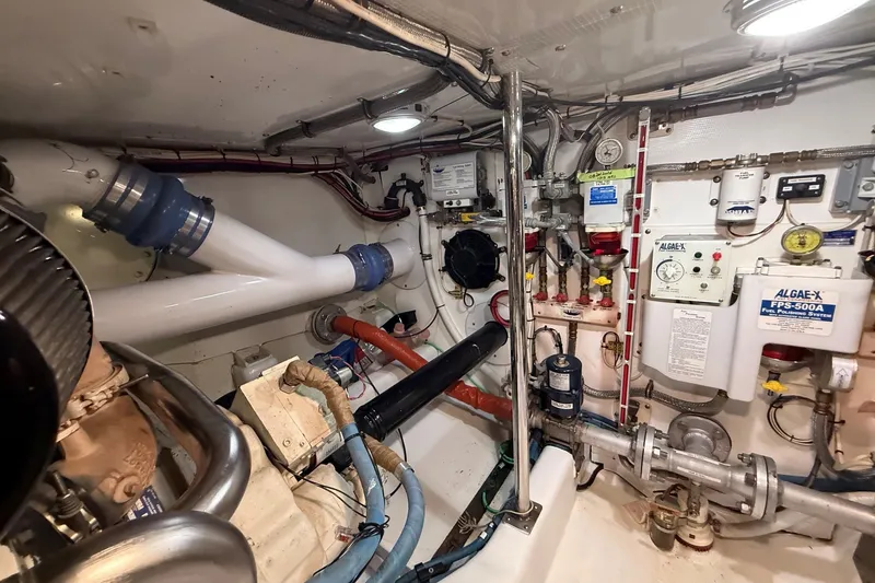Slide: The Image of Engine room of 2013 York's Marine 46 Flybridge Cruiser with fuel polishing system. - 66