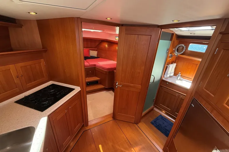 Slide: The Image of Luxurious interior of 2013 York's Marine 46 Flybridge Cruiser with wood finish and modern amenities. - 43