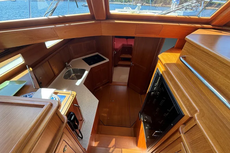 Slide: The Image of Luxurious interior of 2013 York's Marine 46 Flybridge Cruiser with wood finish and modern amenities. - 41