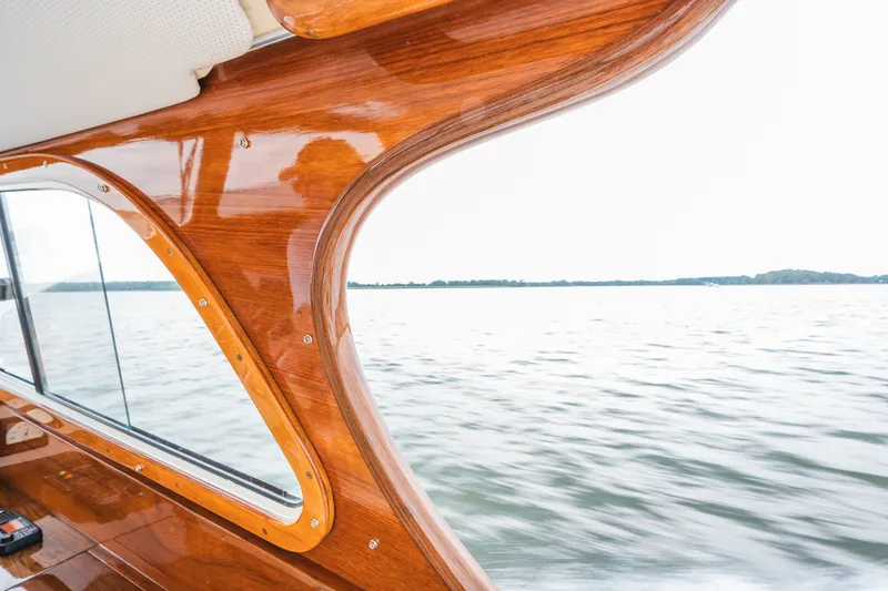 Slide: The Image of Hinckley Picnic Boat 36 Classic, 2000 model, showcasing elegant wooden interior detail. - 7