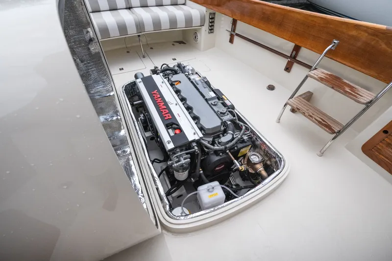 Slide: The Image of Engine compartment of 2000 Hinckley Picnic Boat 36 Classic with Yanmar engine visible. - 1