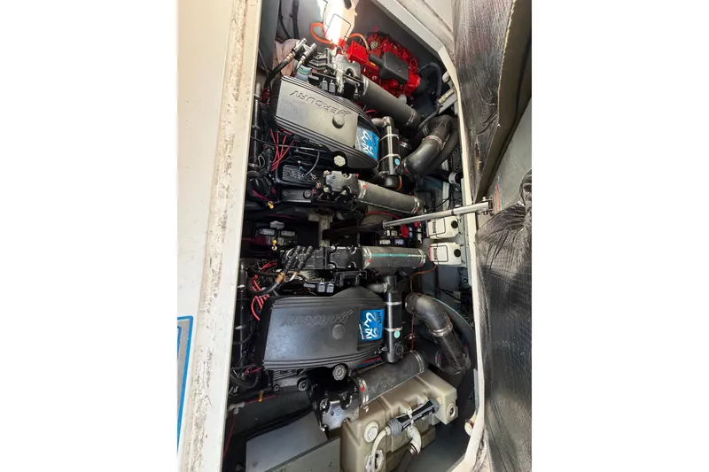 Slide: The Image of Engine compartment of a 2002 Sea Ray 340 Sundancer with twin MerCruiser engines. - 20