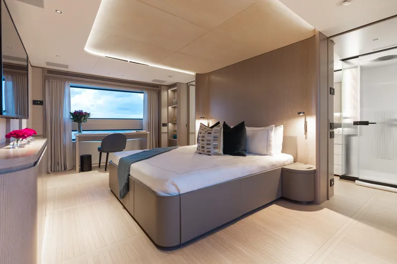 Slide: The Image of Luxurious bedroom interior of 2023 Benetti Oasis 34 yacht with modern design and ocean view. - 17