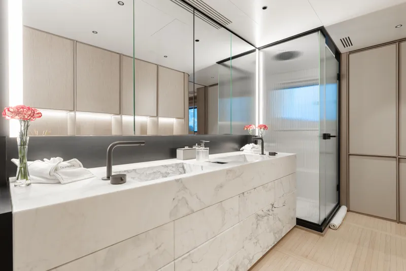 Slide: The Image of Luxurious bathroom in 2023 Benetti Oasis 34 yacht with marble sink and modern fixtures. - 19