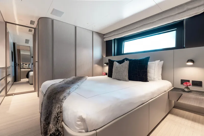 Slide: The Image of Luxurious bedroom interior of 2023 Benetti Oasis 34 yacht with modern design and elegant decor. - 22