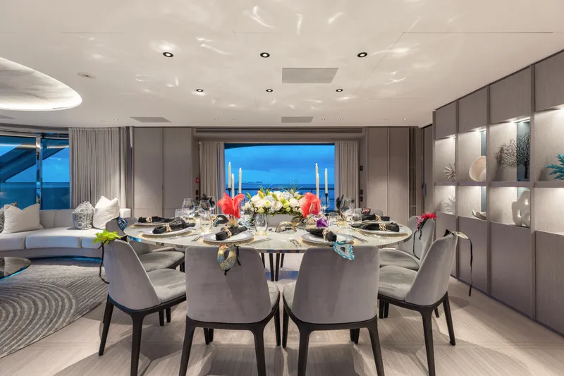 Slide: The Image of Luxurious dining area on 2023 Benetti Oasis 34 yacht with ocean view. - 14