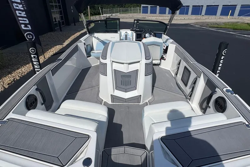 Slide: The Image of 2023 MasterCraft ProStar boat interior with sleek seating and modern design. - 8