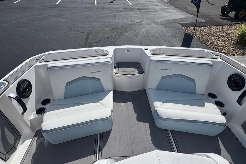 Slide: The Image of 2023 MasterCraft ProStar boat interior with sleek seating and modern design. - 9