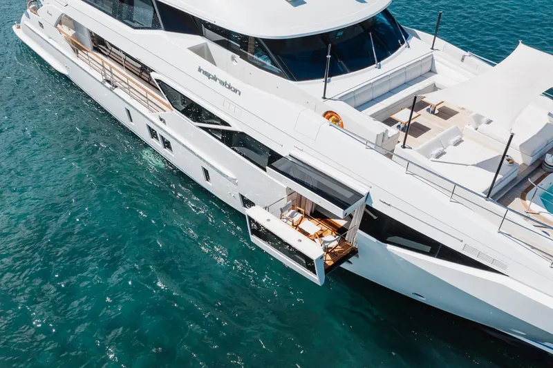 Slide: The Image of Luxury 2018 Benetti Fast 125 yacht on clear blue water, featuring elegant deck design. - 6