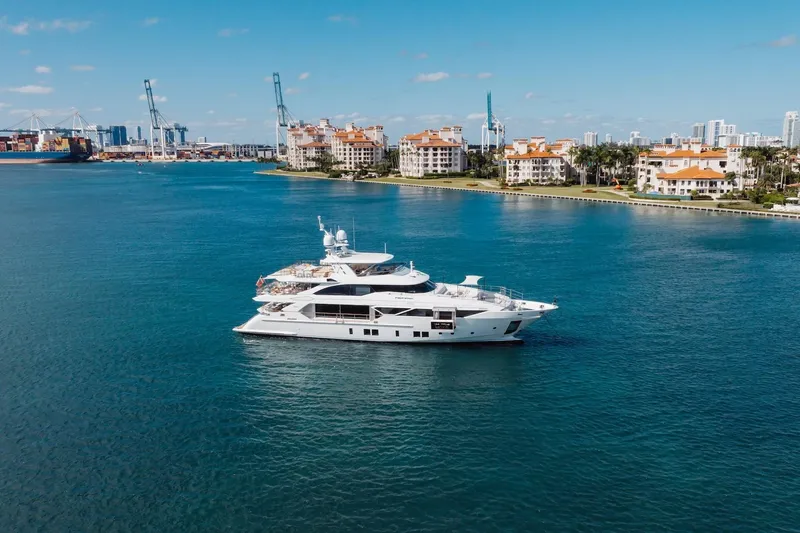 Slide: The Image of Luxury 2018 Benetti Fast 125 yacht cruising near coastal cityscape. - 1