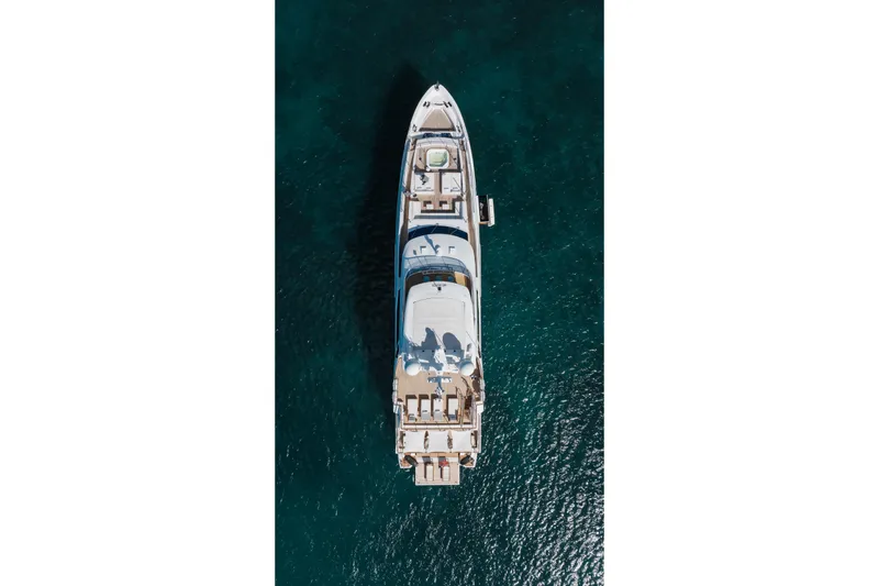 Slide: The Image of Aerial view of 2018 Benetti Fast 125 yacht on clear blue water. - 8