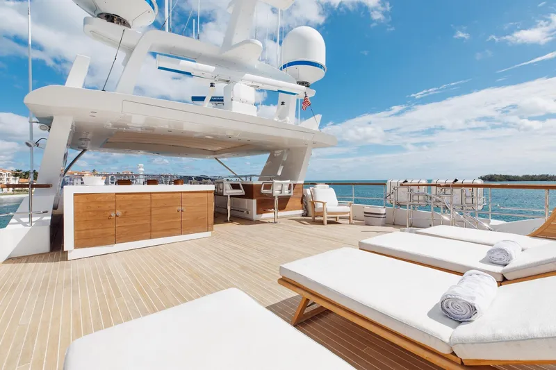 Slide: The Image of Luxurious 2018 Benetti Fast 125 yacht deck with sun loungers and ocean view. - 40