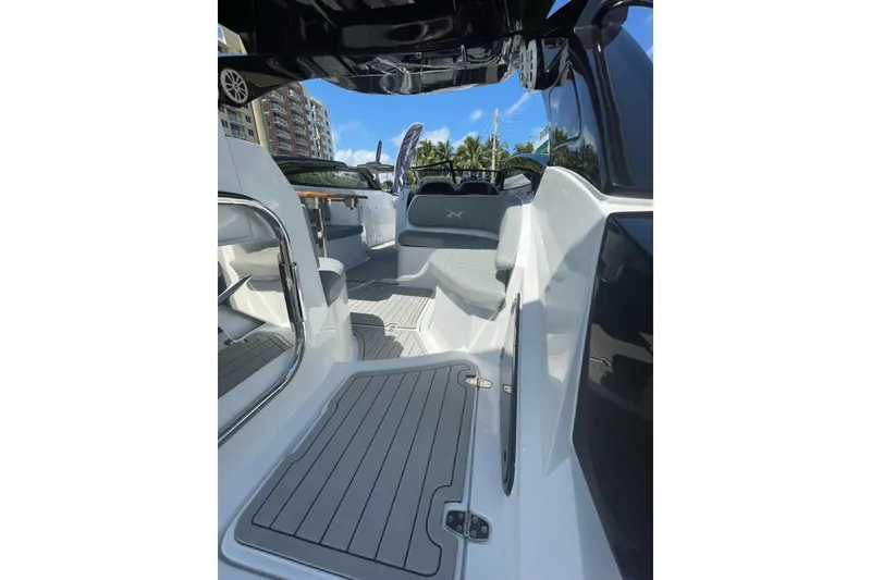 Slide: The Image of 2024 NX Boats NX280 XTREME interior with sleek design and modern features. - 7