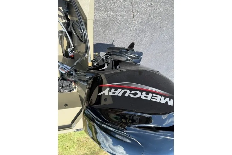 Slide: The Image of 2027 Tracker Grizzly 1648 SC boat with Mercury outboard motor, viewed from above. - 39