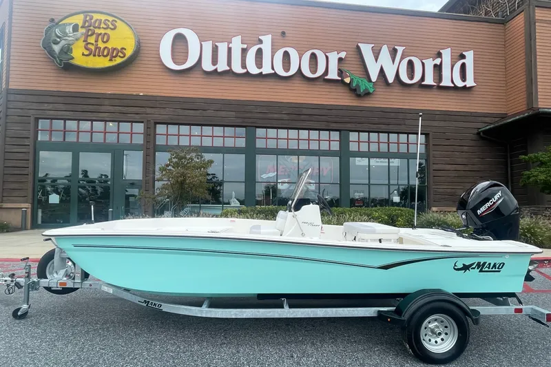 The Image of 2027 Mako Pro Skiff 17 CC boat on trailer outside Bass Pro Shops Outdoor World. - 0