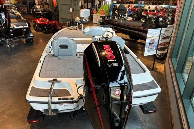 Slide: The Image of 2027 Nitro Z19 XL boat with powerful 200 Pro V8 engine displayed in showroom. - 1