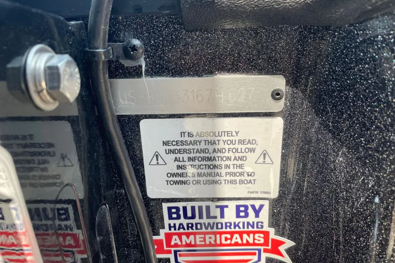 Slide: The Image of 2027 Nitro Z19 XL boat warning label and identification plate. - 117