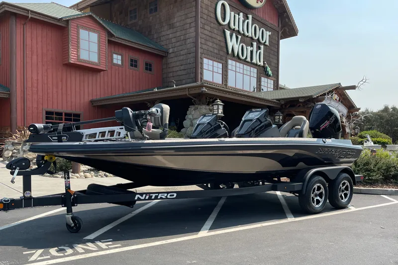 Slide: The Image of 2027 Nitro Z19 XL boat parked outside Outdoor World store. - 3
