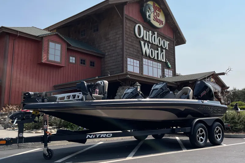 Slide: The Image of 2027 Nitro Z19 XL boat parked outside Bass Pro Shops Outdoor World. - 2
