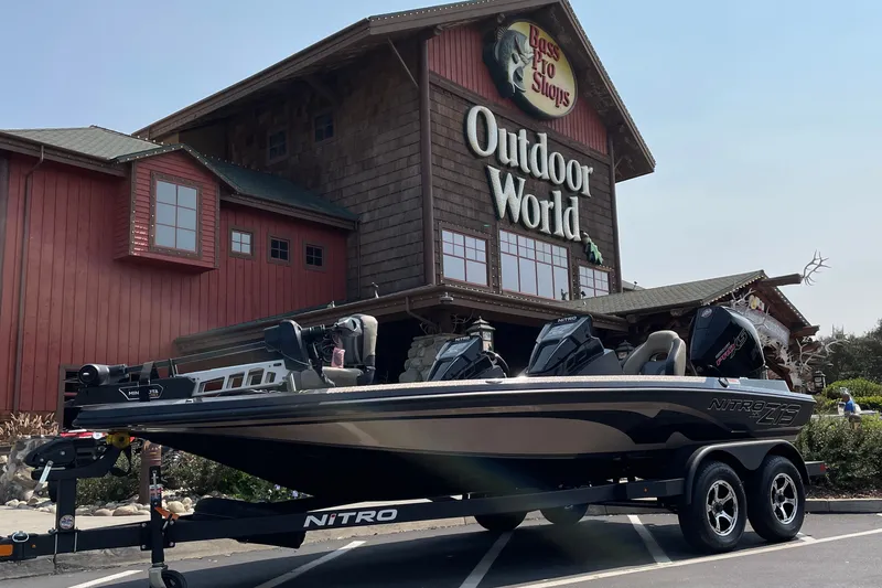 Slide: The Image of 2027 Nitro Z19 XL boat parked outside Bass Pro Shops Outdoor World. - 1