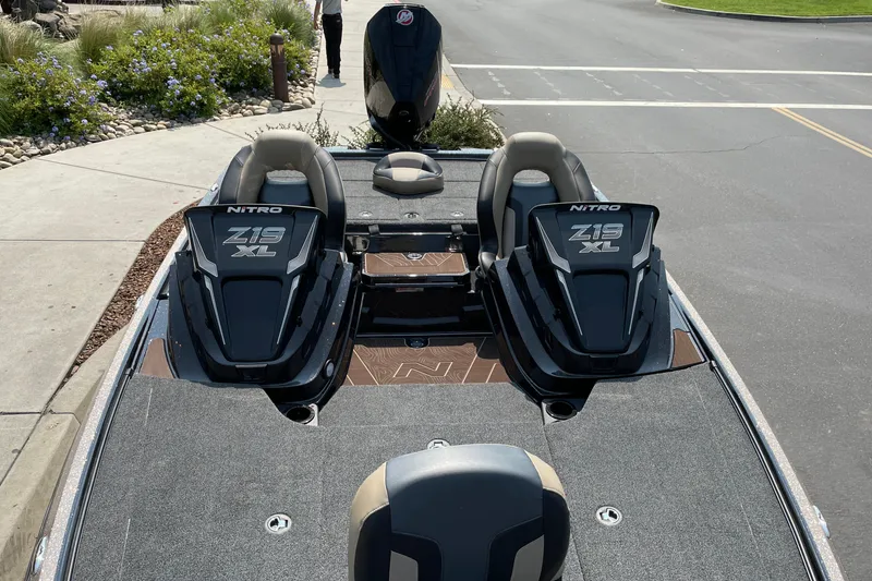 Slide: The Image of 2027 Nitro Z19 XL boat with dual seats and sleek design on a sunny day. - 37