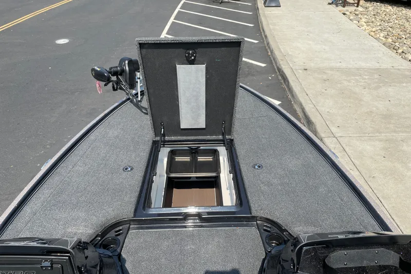 Slide: The Image of 2027 Nitro Z19 XL boat with open storage compartment on deck. - 32