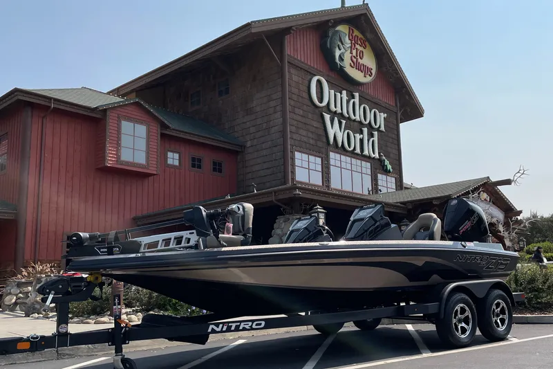 The Image of 2027 Nitro Z19 XL boat parked outside Bass Pro Shops Outdoor World. - 0