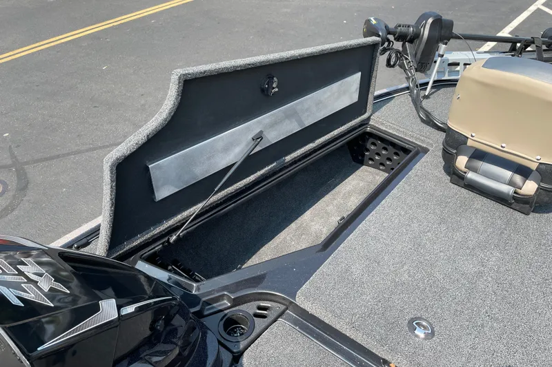 Slide: The Image of Open storage compartment on a 2027 Nitro Z19 XL boat deck. - 29