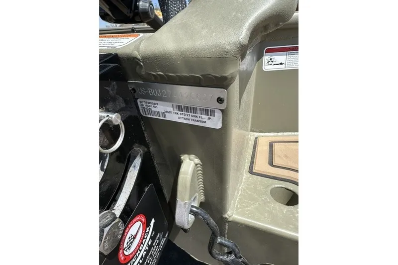 Slide: The Image of 2027 Tracker Grizzly 1650 T Prairie Wings Edition boat detail with identification plate. - 16