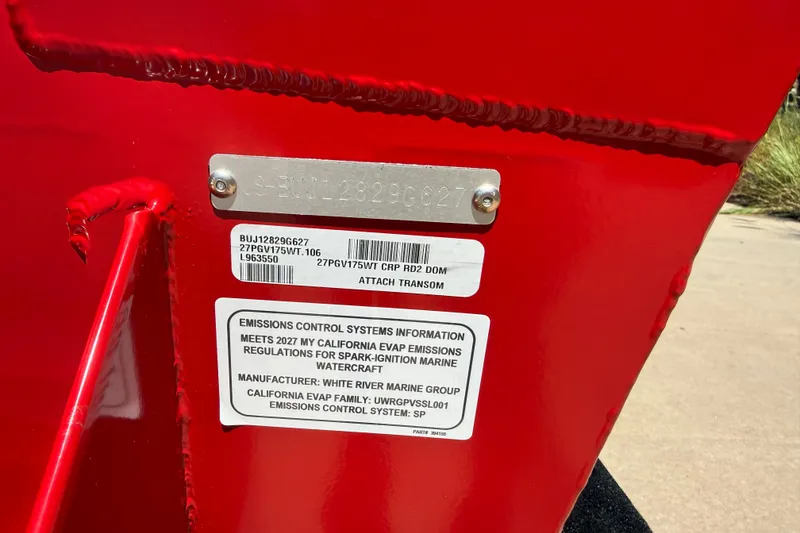 Slide: The Image of Red Tracker Pro Guide V-175 WT 2027 boat with emissions control information label. - 15