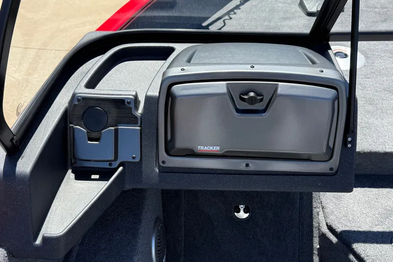 Slide: The Image of 2027 Tracker Pro Guide V-175 WT dashboard with storage compartment and cup holder. - 13