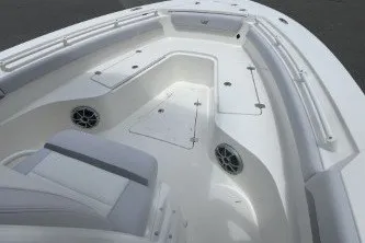 Slide: The Image of 2027 Mako 226 Center Console boat interior with seating and storage compartments. - 8