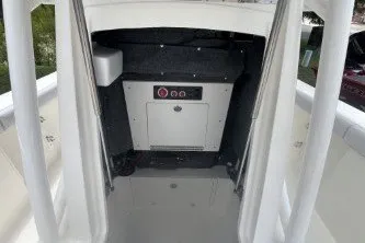 Slide: The Image of 2027 Mako 226 Center Console boat interior with storage compartment. - 7