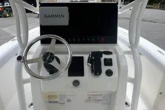 Slide: The Image of 2027 Mako 226 Center Console boat dashboard with Garmin navigation system. - 5