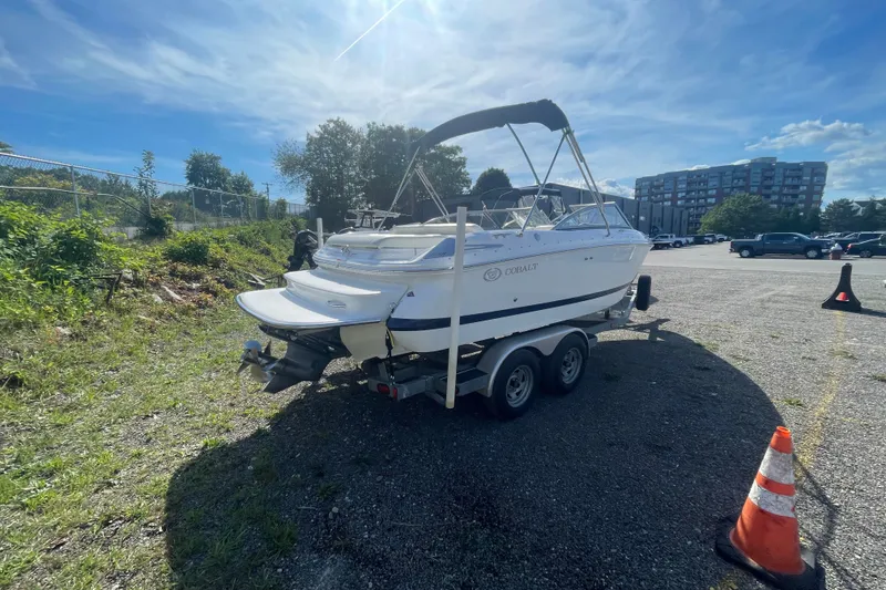 Slide: The Image of 2008 Cobalt 202 boat on trailer in sunny parking lot. - 17