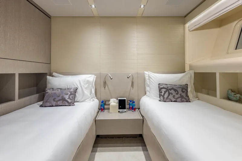 Slide: The Image of Luxurious twin cabin on 2019 Sanlorenzo SD112 yacht, featuring elegant decor and modern amenities. - 49