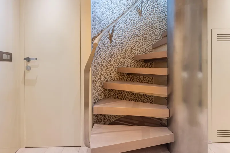 Slide: The Image of Modern spiral staircase on Sanlorenzo SD112 yacht, 2019 model, with textured wall design. - 43