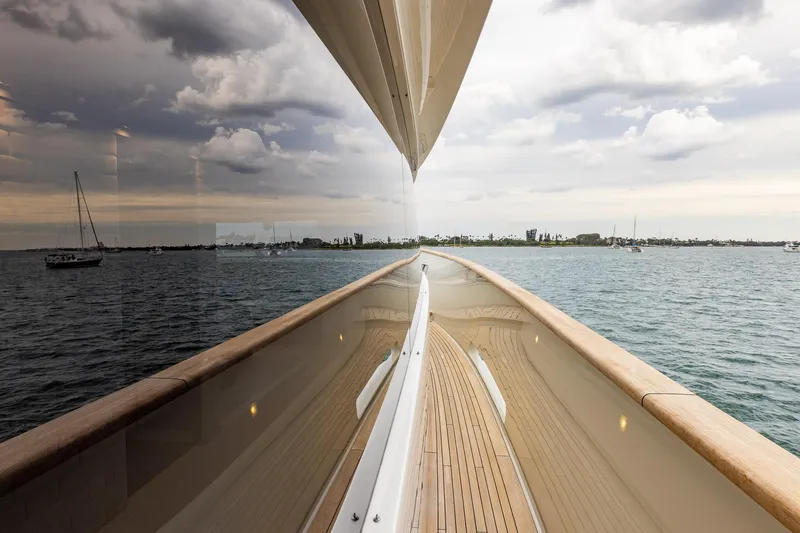 Slide: The Image of Sanlorenzo SD112 yacht deck with ocean view, 2019 model, under cloudy sky. - 38