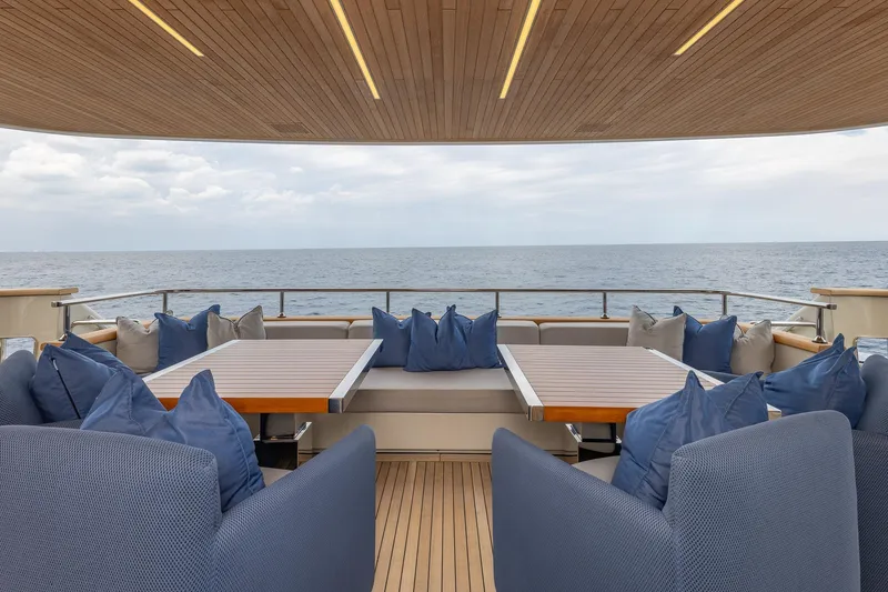 Slide: The Image of Luxurious 2019 Sanlorenzo SD112 yacht deck with elegant seating and ocean view. - 29
