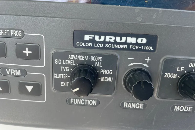 Slide: The Image of Furuno FCV-1100L sounder controls on a 2001 Post 50 Convertible boat. - 34