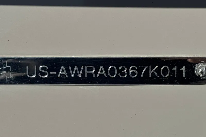 Slide: The Image of VIN plate of a 2011 Axis A22 boat, displaying serial number US-AWRA0367K011. - 35