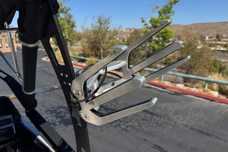 Slide: The Image of Wakeboard tower rack on a 2011 Axis A22 boat, parked outdoors. - 18